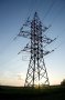 1215129-a-large-electric-post-is-in-the-rays-of-a-sunset[1]