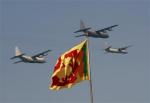 Sri Lankan Air Force planes fly over national flag during Independence Day celebrations in Colombo