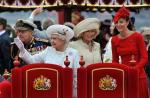 Britain's Queen Elizabeth waves from the Spirit of Chartwell during the Diamond Jubilee River Pageant on the River Thames in London