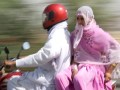 woman-on-motorbike-sidesaddle[1]